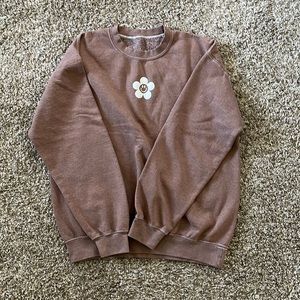 brown smiley face sweatshirt